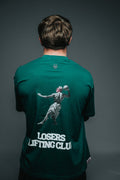 Person wearing a green t-shirt with 'Losers Lifting Club' graphic on the back against a gray background